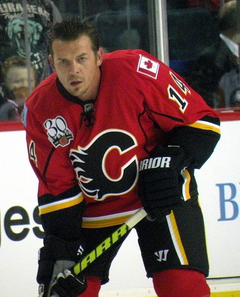 https://www.thecharityreport.com/wp-content/uploads/2021/10/Theoren_Fleury_Flames.jpg